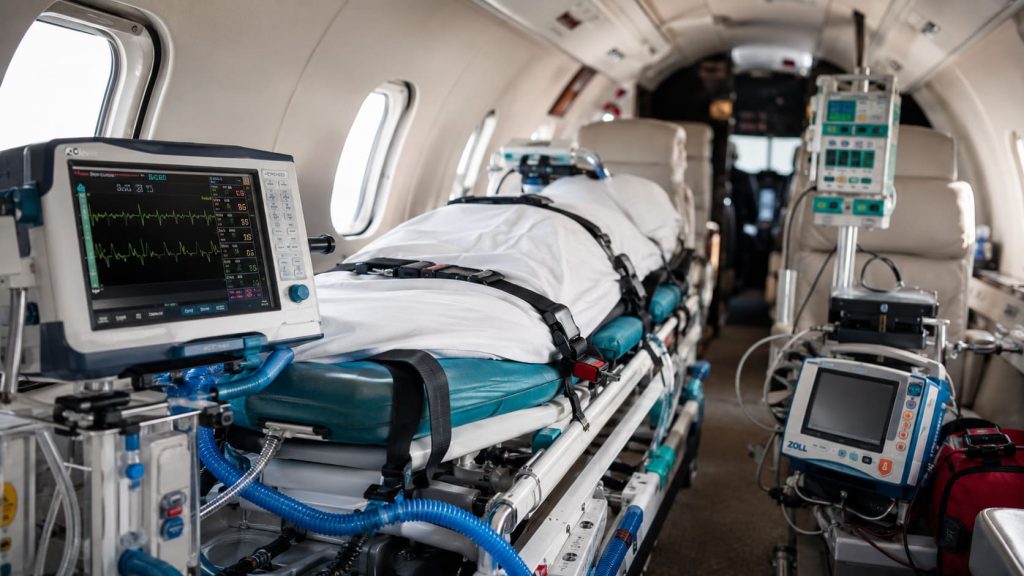 Air ambulance aircraft interior: ventilator, cardiac monitor and stretcher configured for intercontinental patient transport from the Caribbean